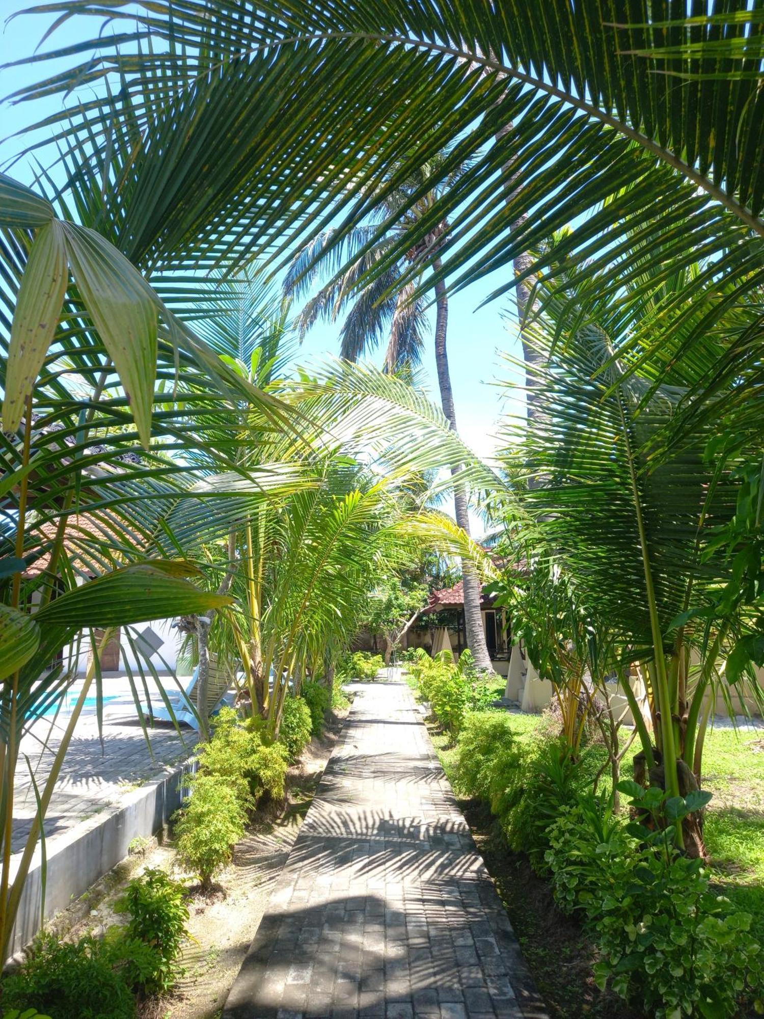 Gguesthouse Kuta  Extérieur photo