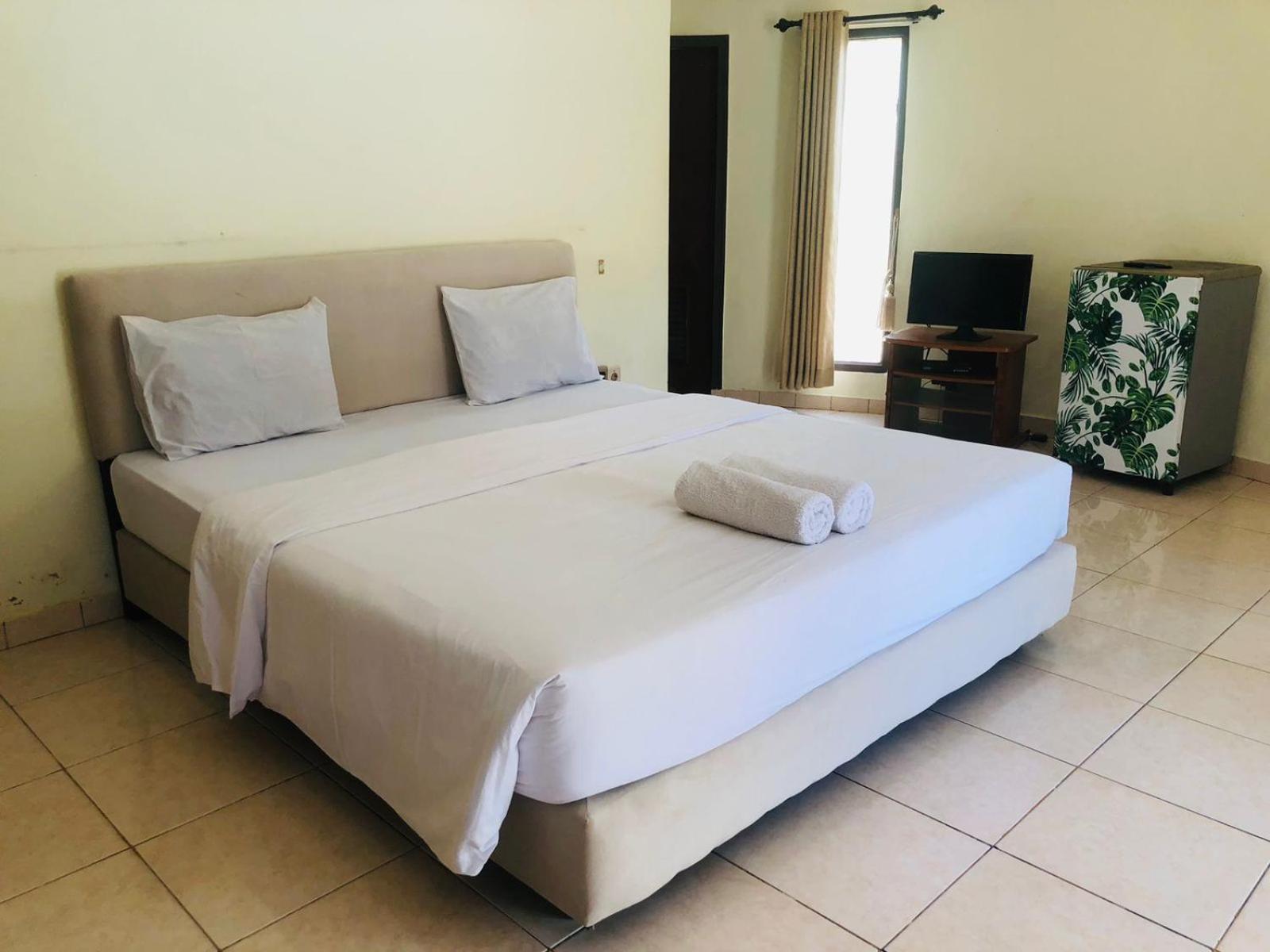Gguesthouse Kuta  Extérieur photo